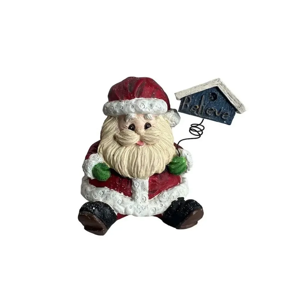 A Berry Merry Christmas Santa Claus Figurine 3
